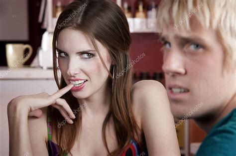 Woman flirting with male friend Stock Photo by ©creatista 39774369