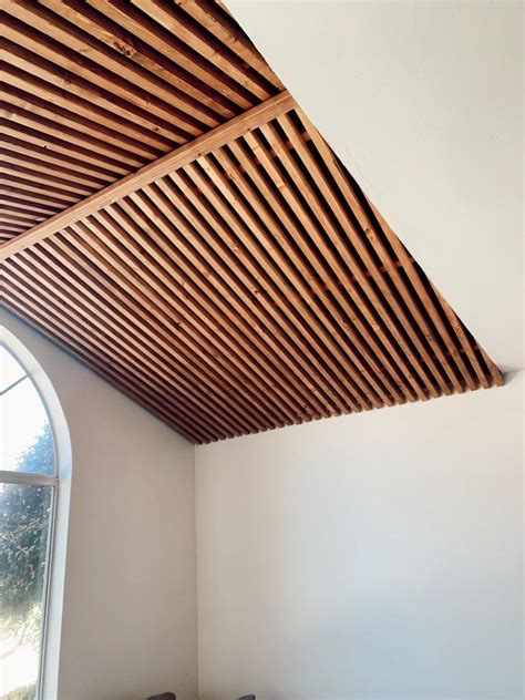 How to diy a wood slat ceiling that will leave you and your guests in ...