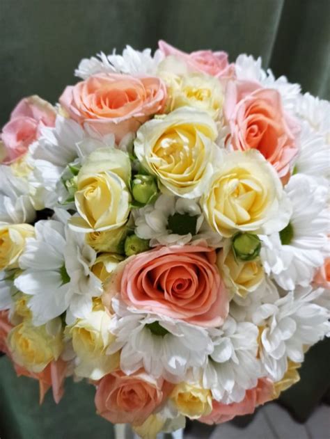 Wedding Bouquet with White, Peach, and Yellow Flowers