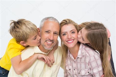 family smiling and showing affection — Stock Photo © Wavebreakmedia ...