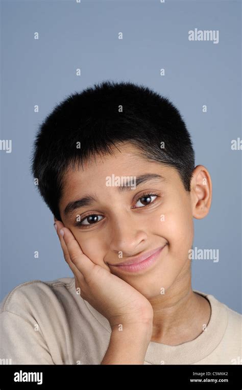 portrait   handsome young indian kid smiling stock photo alamy