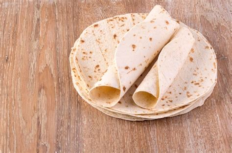 Premium Photo | Tortilla on wooden table