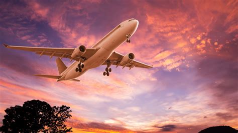 Airplane Taking Off Sunset