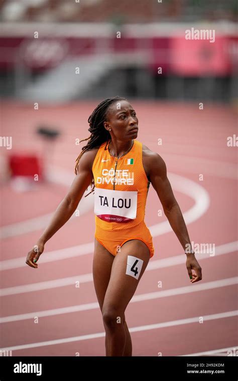 Marie-Josée Ta Lou competing in the 100 meters of the Tokyo 2020 ...