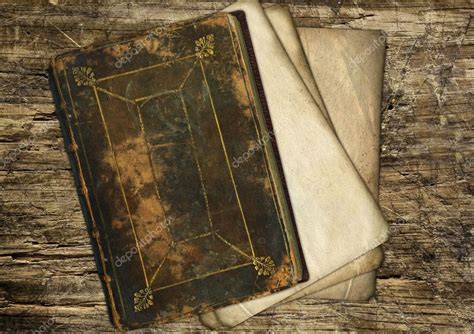 Vintage old paper and book on wood — Stock Photo © katrin #1822181