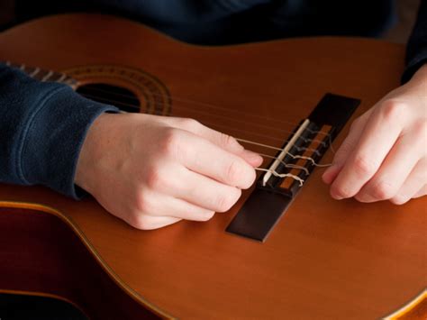How to Restring a Classical Guitar Guide - Guitar Space